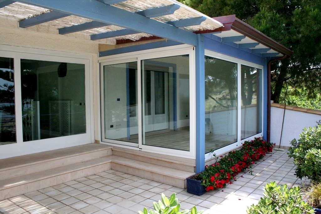 veranda con porte scorrevoli termoisolata co.serr siracusa